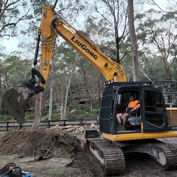 Excavator in use during bushland excavation by Rural Property Services NSW